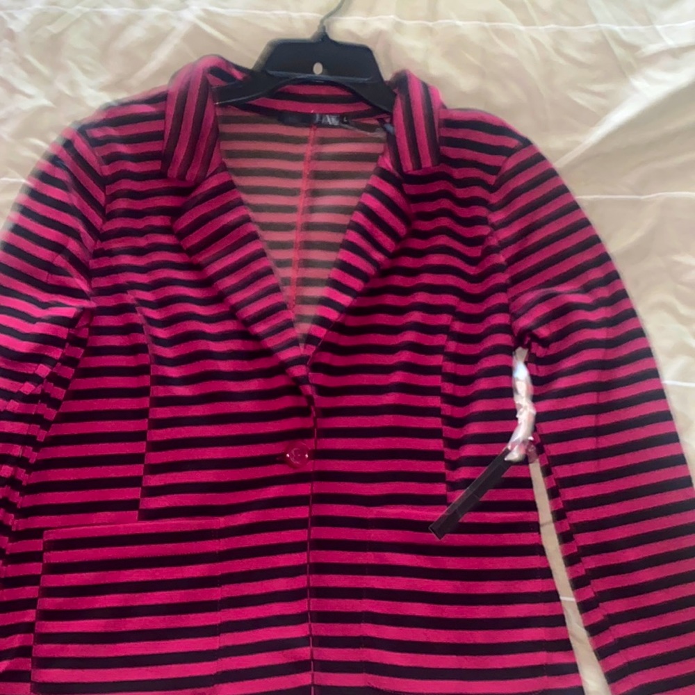 NWT.  Have striped purple / black jacket size large